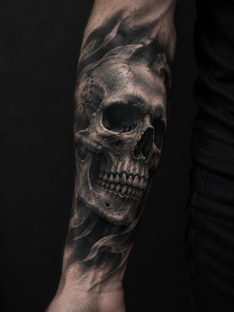 Smoke Skull — skulls tattoo on the forearm